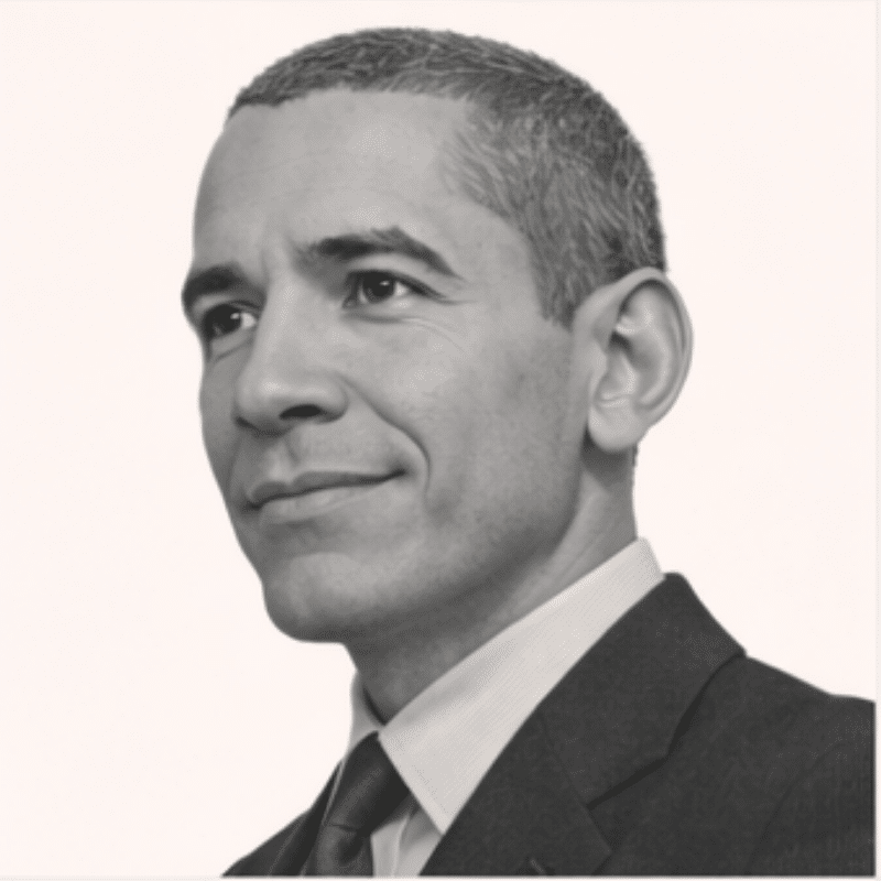 Professional head-and-shoulders portrait of a man in a suit and tie, looking slightly upward and to the left.